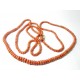 "CORALIA" Long sautoir en perles de corail début Xxème, fermoir mousqueton en or 750