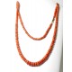 "CORALIA" Long sautoir en perles de corail début Xxème, fermoir mousqueton en or 750