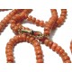 "CORALIA" Long sautoir en perles de corail début Xxème, fermoir mousqueton en or 750